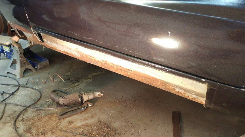 Rocker panel off, we get to see the horror beneath. Actually not all that horrifying.